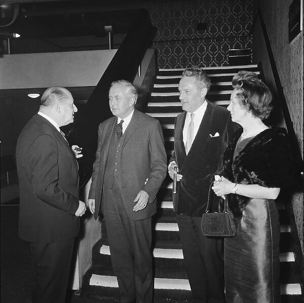 Media mogul Lew Grade (left) pictured with Prime MInister Harold Wilson (second left)