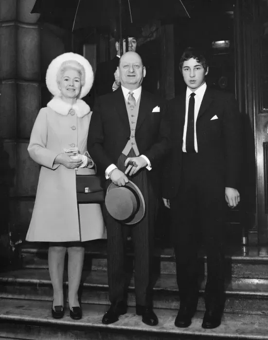 Framed Print : Media Mogul Lew Grade, stands underneath an umbrella with his wife Lady Grade Framed Print : Media Mogul Lew Grade, stands underneath an umbrella with his wife Lady Grade