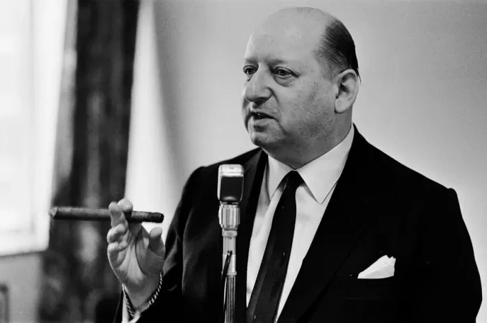 Framed Print : Media Mogul Lord Lew Grade makes a speech at a dinner party, holding a cigar