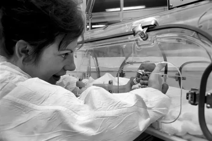 Framed Print : Medical. Mrs. Rosemary Letts holds baby Cara for the first time in the incubator Framed Print : Medical. Mrs. Rosemary Letts holds baby Cara for the first time in the incubator