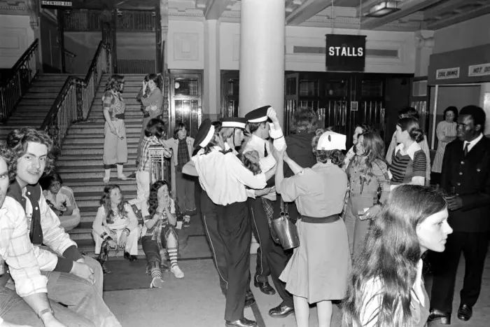 Framed Print : Medical officers attend to injured fans of the Bay City Rollers at their gig in Cardiff