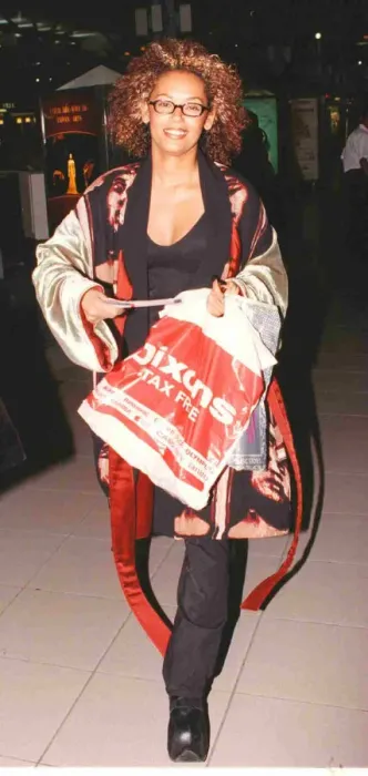 Framed Print : Mel B of the Spice girls leaves Heathrow for Paris Framed Print : Mel B of the Spice girls leaves Heathrow for Paris