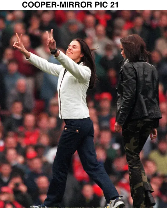 Framed Print : MEL C OF THE SPICE GIRLS GIVES THE V SIGN TO MANCHESTER UNITED FANS WHO TAUNTED HER WITH