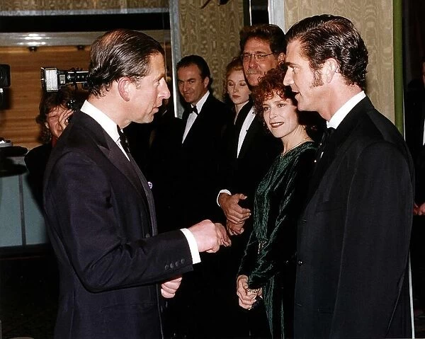 Mel Gibson actor speaking to Prince Charles at the premiere of his film '