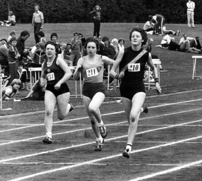 Framed Print : Melanie Moore (right), surges to the front in her heat of the junior girls sprint to give