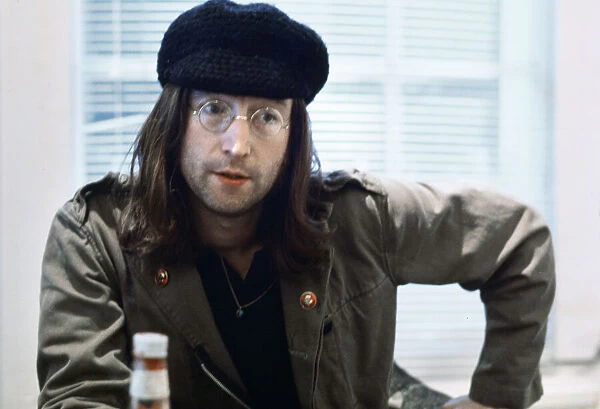 Former member of The Beatles pop group John Lennon, with recently trimmed beard