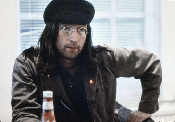 Former member of The Beatles pop group John Lennon, with recently trimmed beard