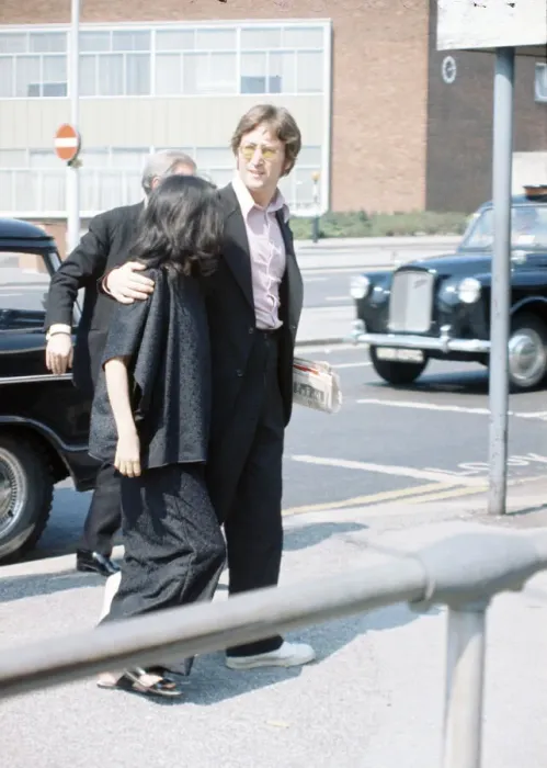 Framed Print : Former member of The Beatles pop group John Lennon with his wife Yoko Ono at Heathrow Framed Print : Former member of The Beatles pop group John Lennon with his wife Yoko Ono at Heathrow