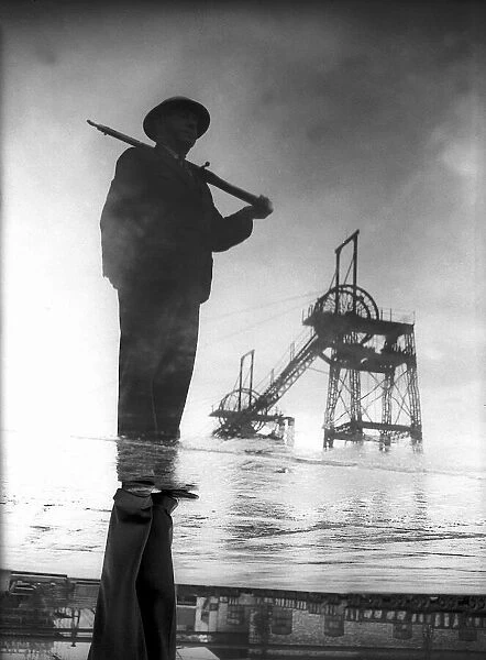A member of the Home Guard stands guard over a British coalmine
