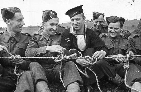 Members of the Army and Navy in World War Two, tie various knots in rope
