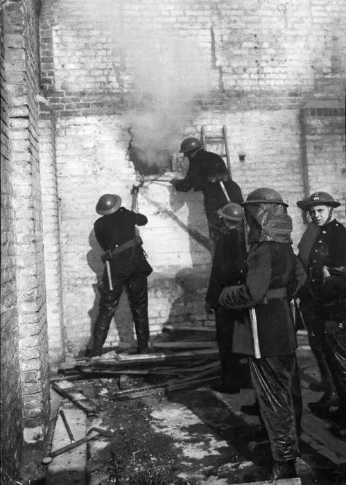 Framed Print : Members of The Auxiliary Fire Service (AFS) hard at work as walls, during World War Two Framed Print : Members of The Auxiliary Fire Service (AFS) hard at work as walls, during World War Two