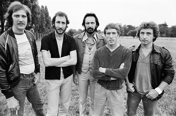 Members of the British rock group The Who pose for pictures after new drummer Kenney