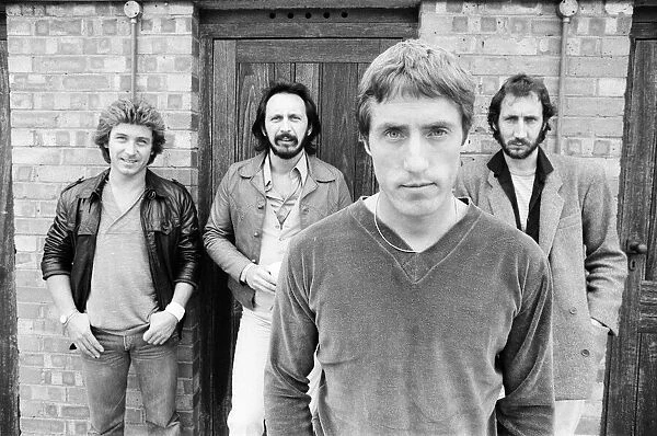 Members of the British rock group The Who pose for pictures after new drummer Kenney