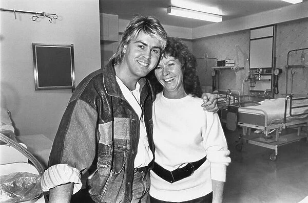 Members of Bucks Fizz - Mike Nolan with Sister Margaret Sayer at Newcastle General