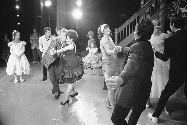 Members of the cast of Grease seen here on stage at the Coventry Theatre during a dress