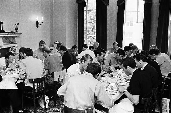 Members of the England football squad and management eating breakfast at the team hotel