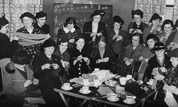 Members of the Heaton Social Service Knitting Party making garments for troops