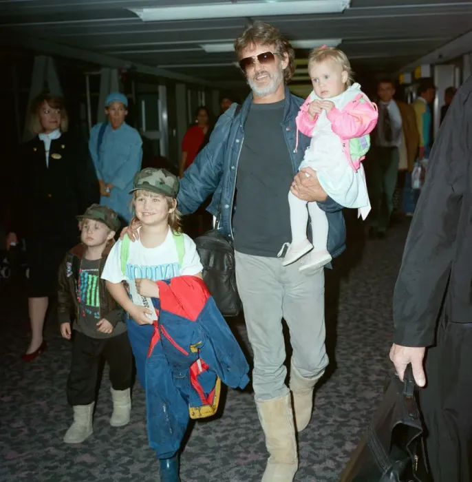 Framed Print : Members of The Highwaymen at Heathrow Airport. Kris Kristofferson and children Framed Print : Members of The Highwaymen at Heathrow Airport. Kris Kristofferson and children