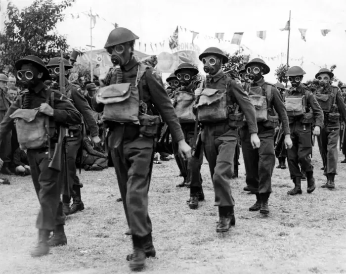 Framed Print : Members of the Home Guard march whilst wearing gas masks. 14  /  07  /  1942