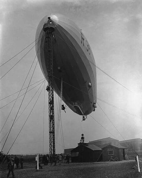 Members of Parliament visit the Airship R36 at Pulham. Passengers board the airship by