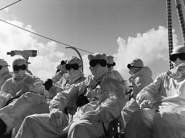 Members of the press and naval ratings aboard HMS Alert 35 miles offshore of Malden