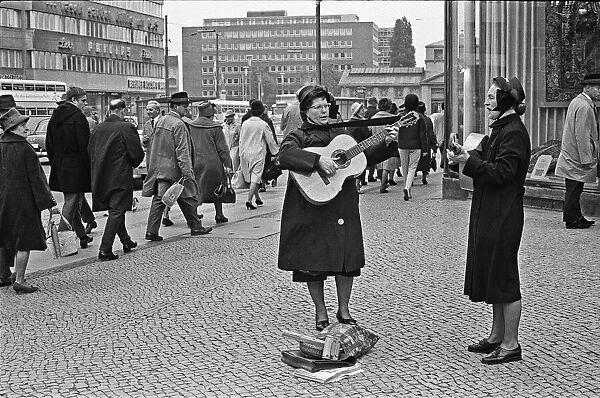 Members of the Salvation Army perform on the corner of Passauer Strasse