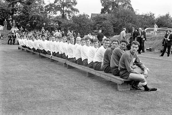 Members of the Tottenham Hotspur team line up for a group photograph before training