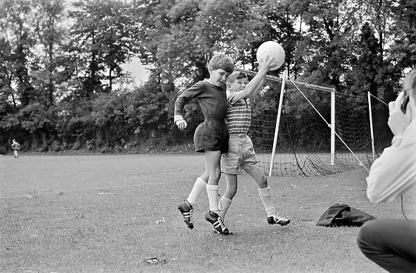 Members of the Tottenham Hotspur team training. Children of the Spurs players make