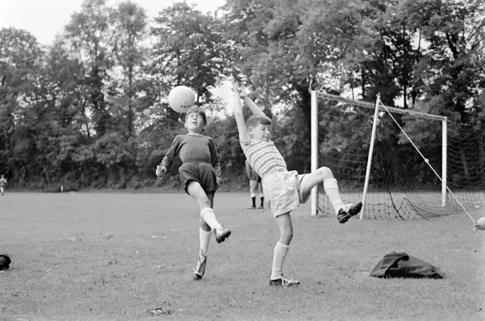 Framed Print : Members of the Tottenham Hotspur team training. Children of the Spurs players make