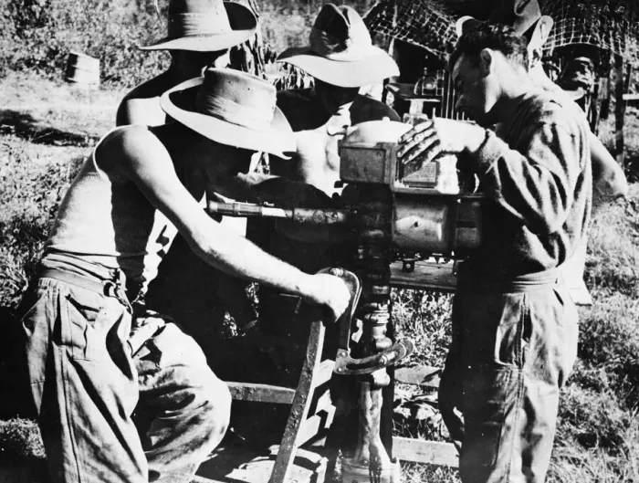 Framed Print : Men of the 36th Division with the Royal Welch Fusiliers working with a salvaged outboard Framed Print : Men of the 36th Division with the Royal Welch Fusiliers working with a salvaged outboard