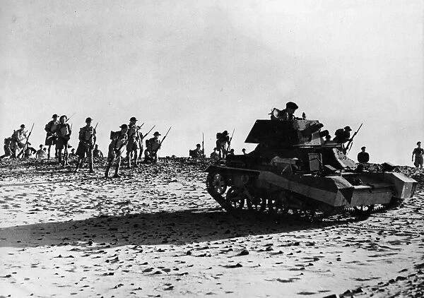Men of the Australian Imperial Forces practice manoeuvres in the Libya desert
