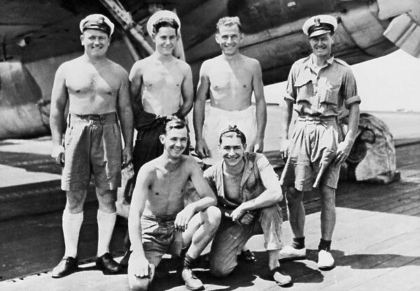 Men of a British carrier in the Far East. Back row: D. J. Williams, D. J. Cole, E. Tobin, T