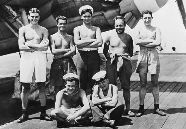 Men of a British carrier in the Far East. Back row: J. Savory, F. J. Parson, T. Dancy