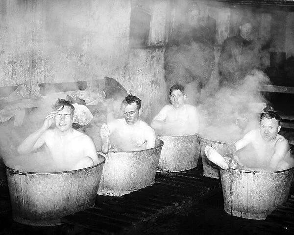 Men of the Dorset County Regiment with the B. E. F. enjoy a hot bath - 1940