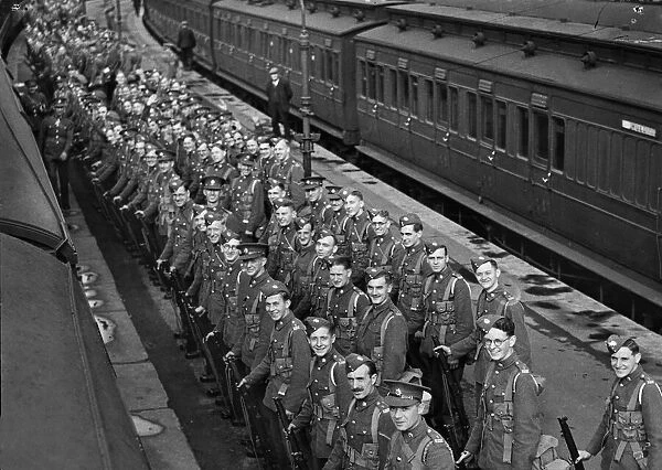 Men of the East Yorkshire Regiment pictured at a railway station in Gloucestershire
