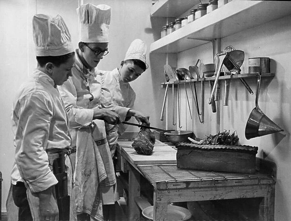 Men of the Merchant navy are now being trained as cooks in the school where many world