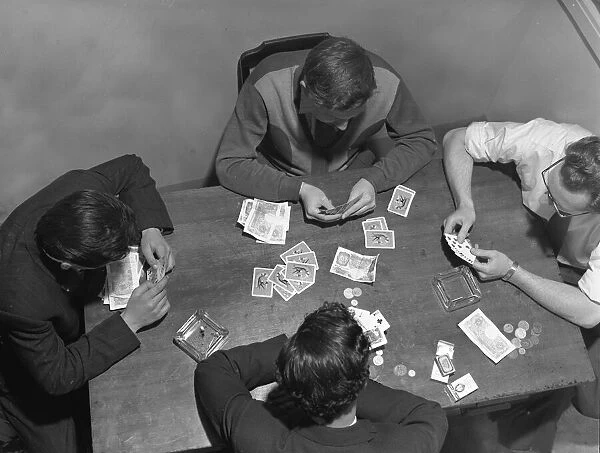 Men playing poker. April 1959