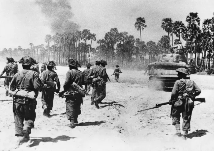 Framed Print : Men of the Punjab rifles advance on Meiktila behind a Sherman tank. Circa 1940s Framed Print : Men of the Punjab rifles advance on Meiktila behind a Sherman tank. Circa 1940s