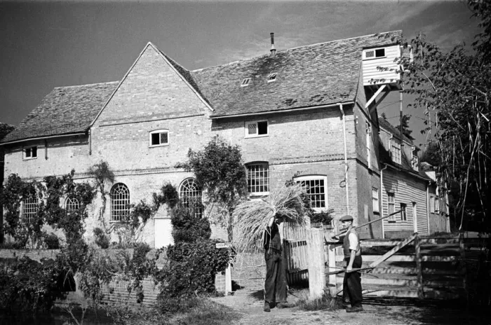 Framed Print : Two men at work at Flatford Mill, on the River Stour close to the Suffolk-Essex border Framed Print : Two men at work at Flatford Mill, on the River Stour close to the Suffolk-Essex border