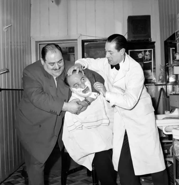 Framed Print : Mens Barbers Shop: Mr. Thomas the barber seen here having a joke with some of his Framed Print : Mens Barbers Shop: Mr. Thomas the barber seen here having a joke with some of his