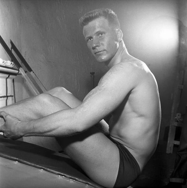 Mens Health: Body builder Larry Stevens seen here exercising in the gym. 1957