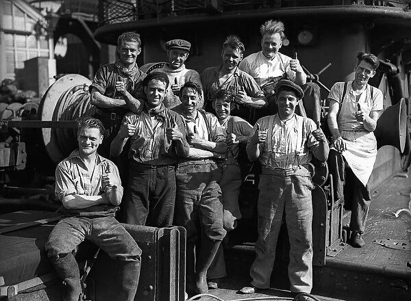 Merchant Seamen during WW2 giving the 'Thumbs Up'Circa 1941
