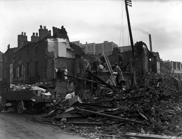 Merseyside Air Raid Bomb Damage Members of the salvage squad search through