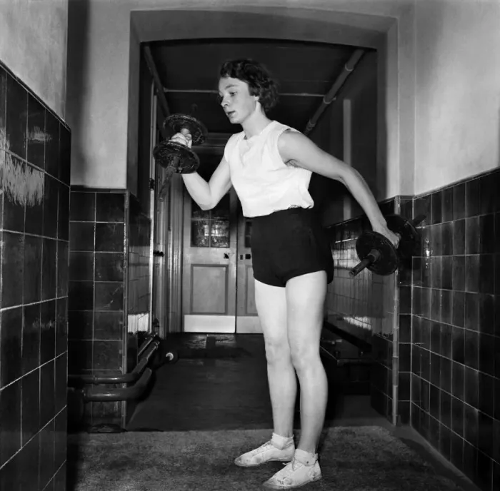 Framed Print : Metal boots to give her more speed. Schoolgirl with metal boots is schoolgirl champion Framed Print : Metal boots to give her more speed. Schoolgirl with metal boots is schoolgirl champion