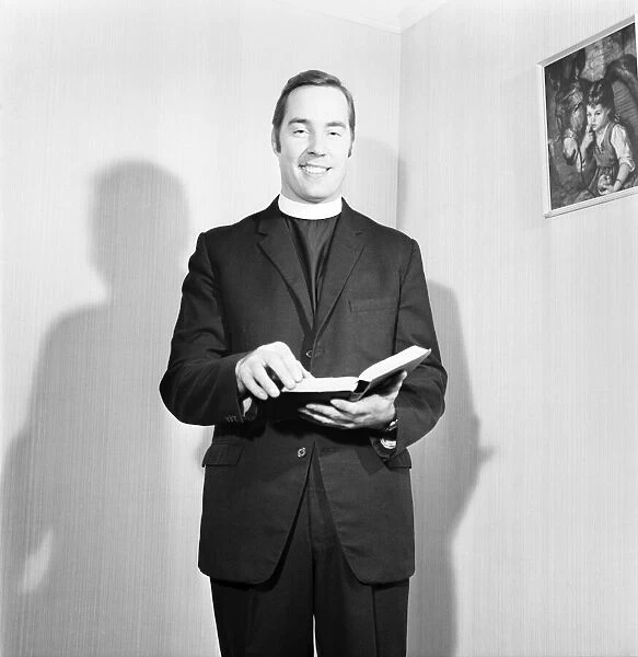 A Methodist minister reading from the Bible. November 1969 Z10935-005