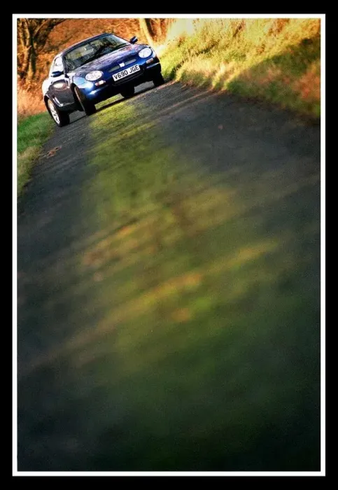 Framed Print : MG MGF December 1999 Narrow road dark blue paintwork V690 JGE Framed Print : MG MGF December 1999 Narrow road dark blue paintwork V690 JGE