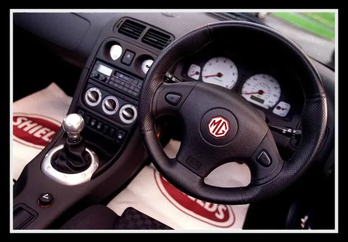Framed Print : MG MGF December 1999 Steering wheel dashboard interior cockpit MG logo badge