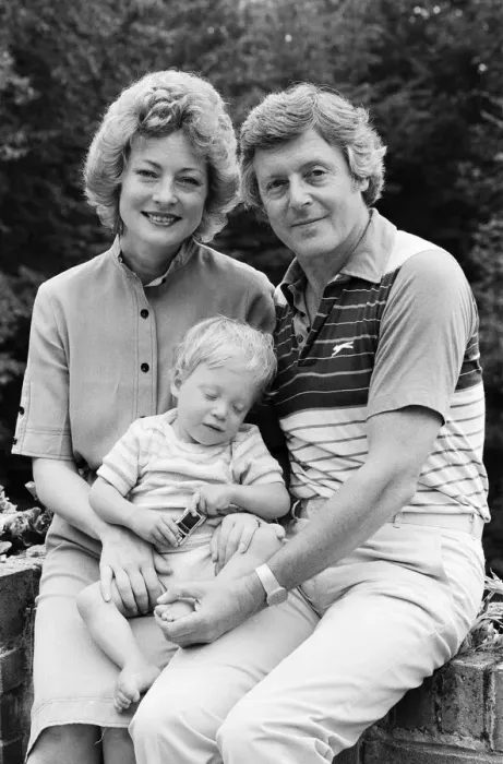 Framed Print : Michael Aspel pictured at home with his wife Lizzie Power and their son. September 1982 Framed Print : Michael Aspel pictured at home with his wife Lizzie Power and their son. September 1982