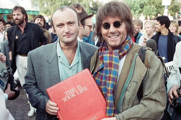 Michael Aspel surprises Phil Collins for the TV show 'This is your Life'