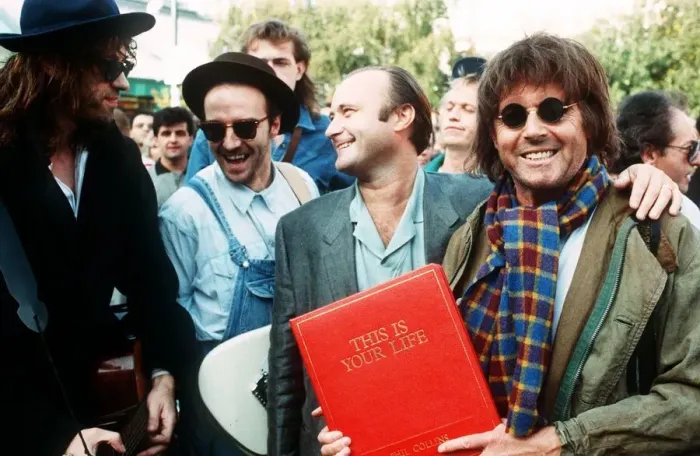 Framed Print : Michael Aspel TV Presenter surprises Phil Collins for the show This is your Life with